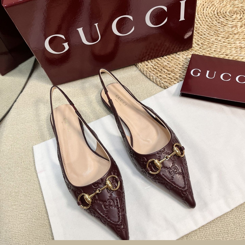 G*u*i sandals